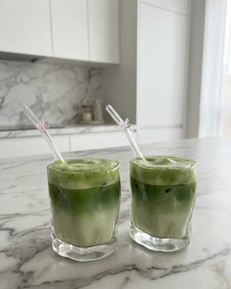 Two ceremonial matcha lattes