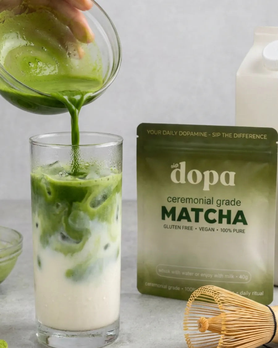 Iced Dopa matcha latte being poured