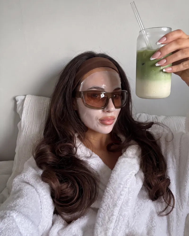 Dopa drinker enjoying an iced matcha